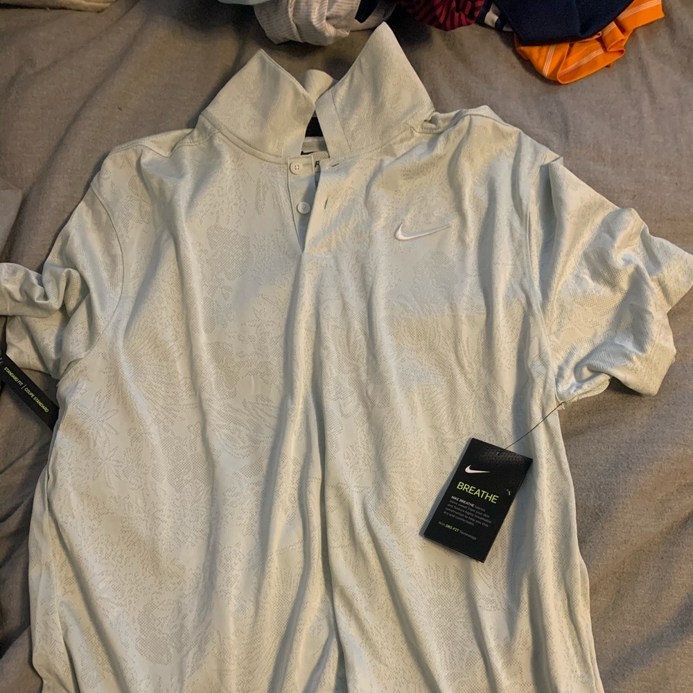 BRAND NEW 2019 Nike Golf polo. Medium